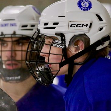 Five schools, one team: St. Paul’s hockey co-op works to bond and succeed