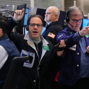 US stocks open higher and gold tops $5,000 an ounce