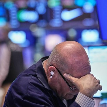 Wall Street ticks higher following a mixed report on the job market