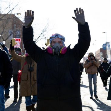From frigid quiet to outraged sorrow, a few hours on Minneapolis street where agents killed man