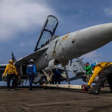 Iran-backed militias in Iraq and Yemen threaten new attacks as US aircraft carrier arrives