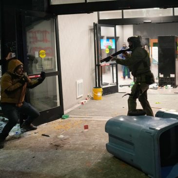 Anti-ICE protesters clash with federal agents at Minneapolis hotel