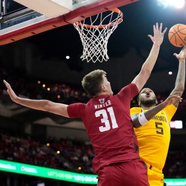 Men’s basketball: Badgers rally past visiting Gophers