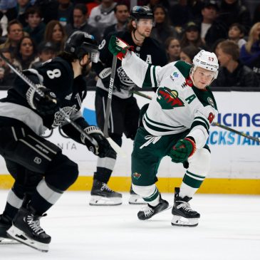 Kings hold off Wild comeback bid