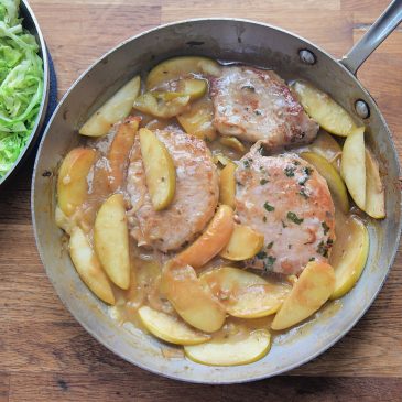 One-pot recipe brings together pork chops, apples and warm cabbage slaw